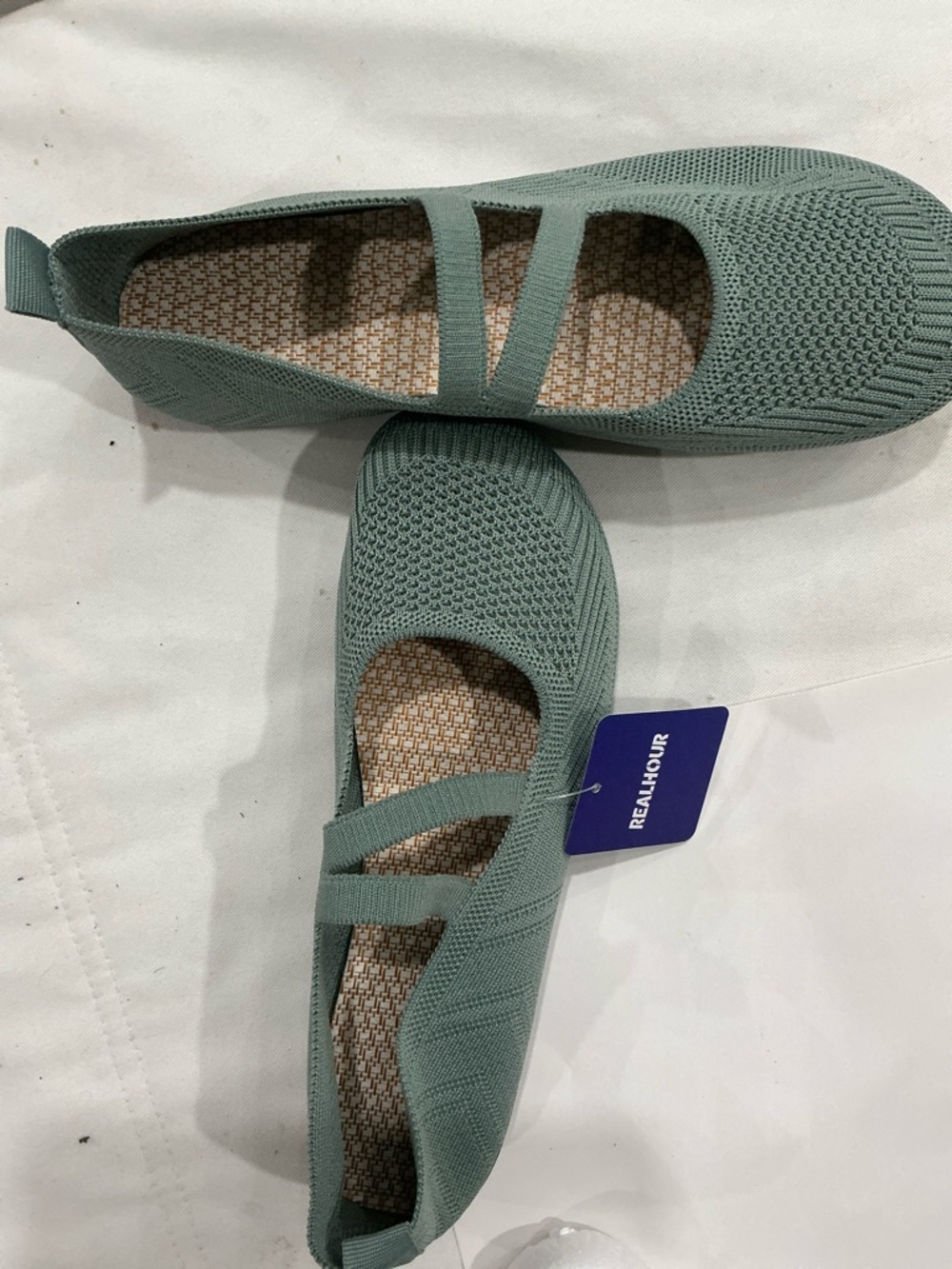 Size 9 new shoe in a sage green. Extremely comfortable for running about